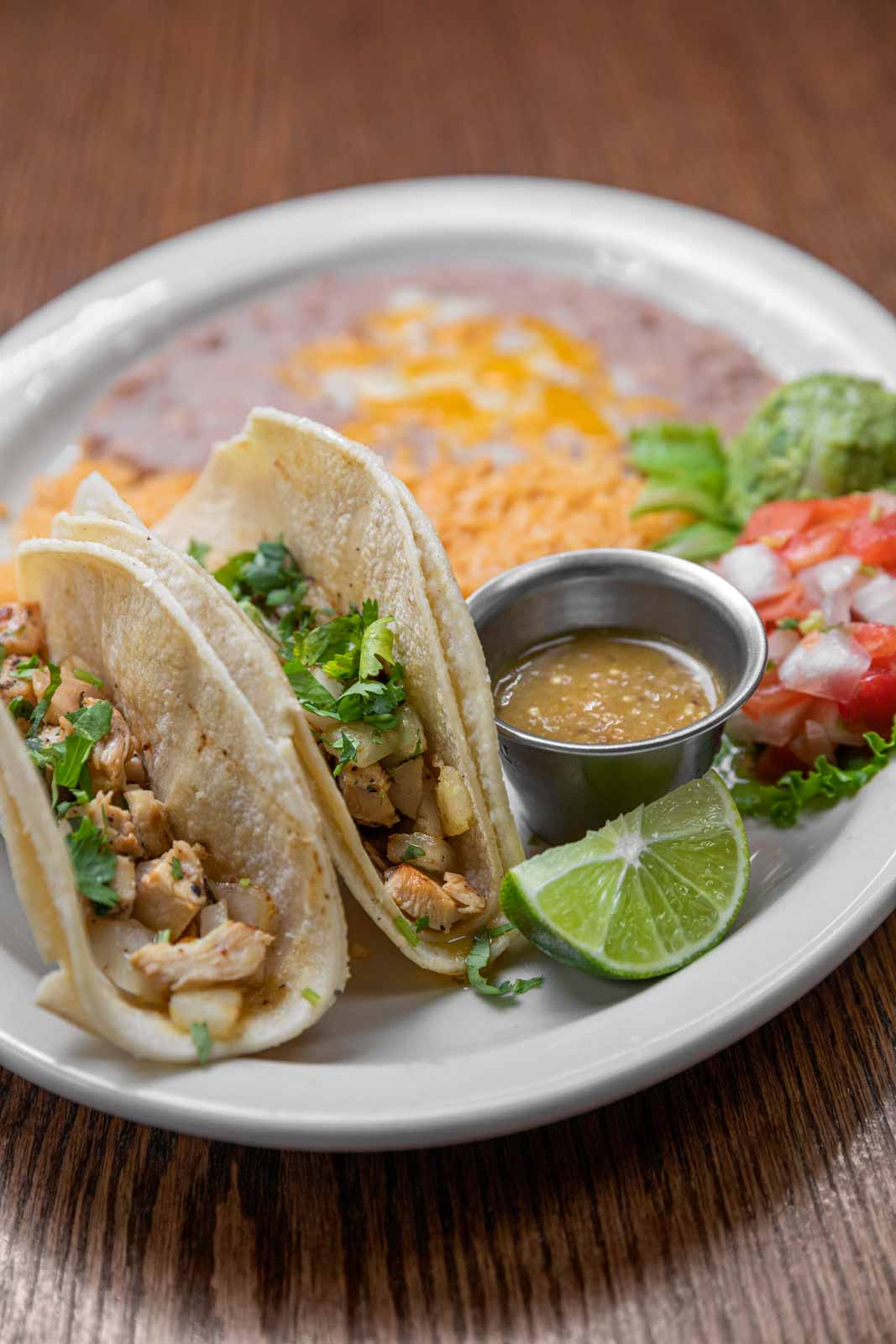 Chicken Soft Tacos and Refried Beans at Pecina's Mexican Cafe